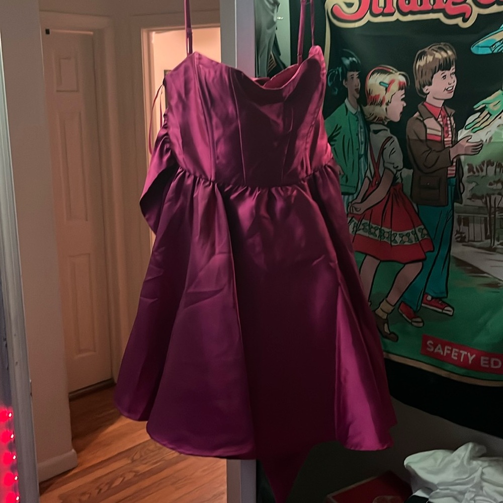 Pinkish/purple homecoming bow dress.